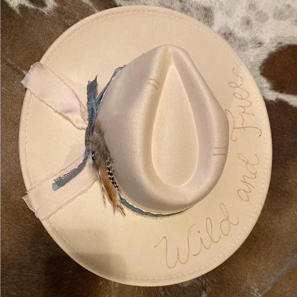 Felt burnt hat with feathers